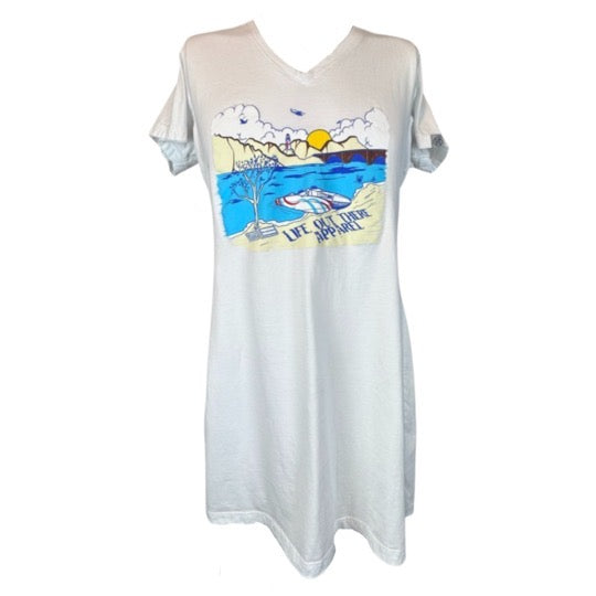 White T-shirt by Life Out There Apparel, featuring a colorful graphic that captures the charm of Lake Havasu with elements like a lake, mountains, trees, and a boat under a yellow sun. Embracing the summer spirit, it reads "Life is Better at the Lake." This is part of The Havasu Women's Cover Up collection. Sizing guide: S/M corresponds to Medium and L/XL to Extra Large.