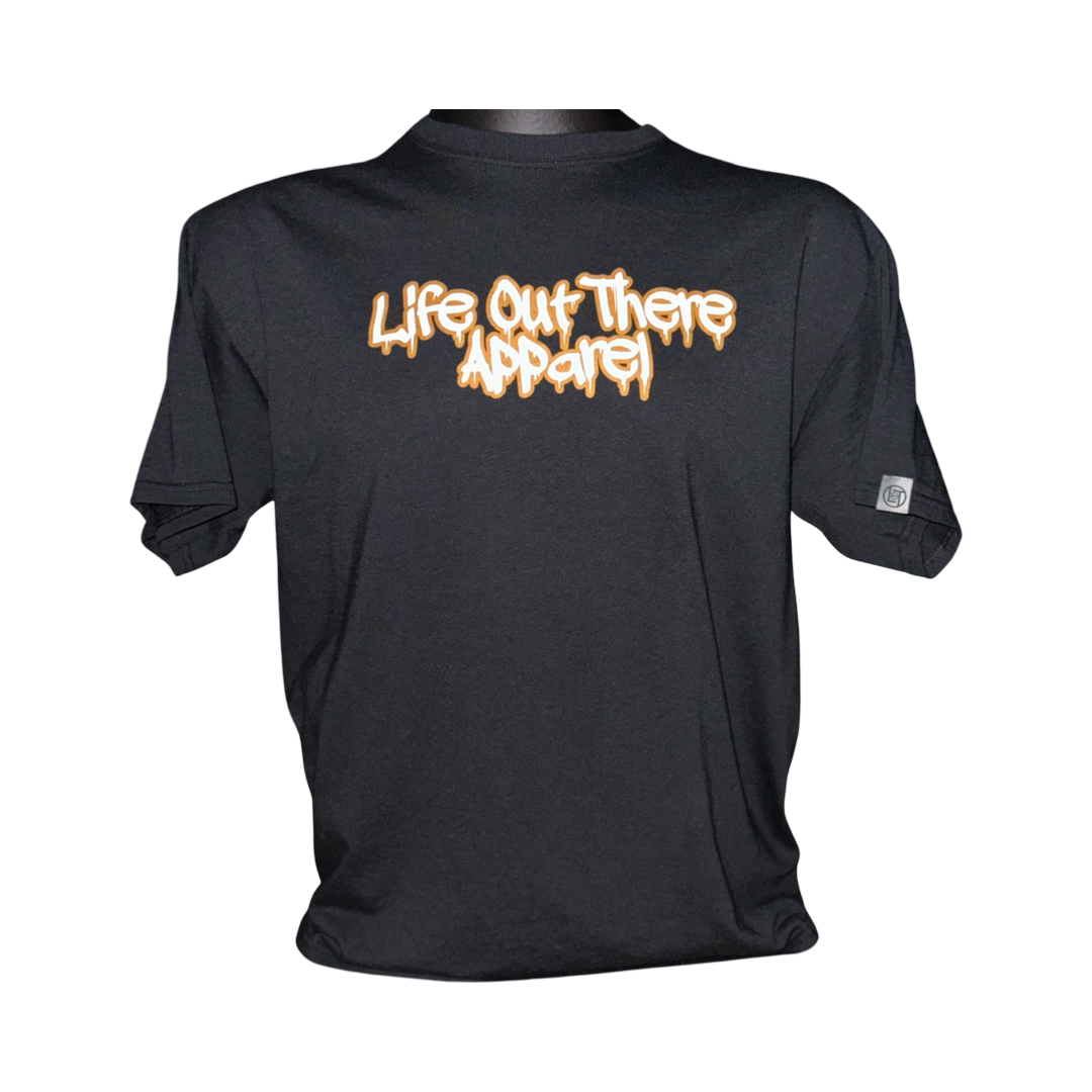 Life Out There Apparel “Fun is Not a Crime” Black Unisex tee shirt has a skateboarder and bmx rider having fun on a half pipe skateboard ramp. This picture has the front of the shirt, which look like it was spray painted, with a transparent background.
