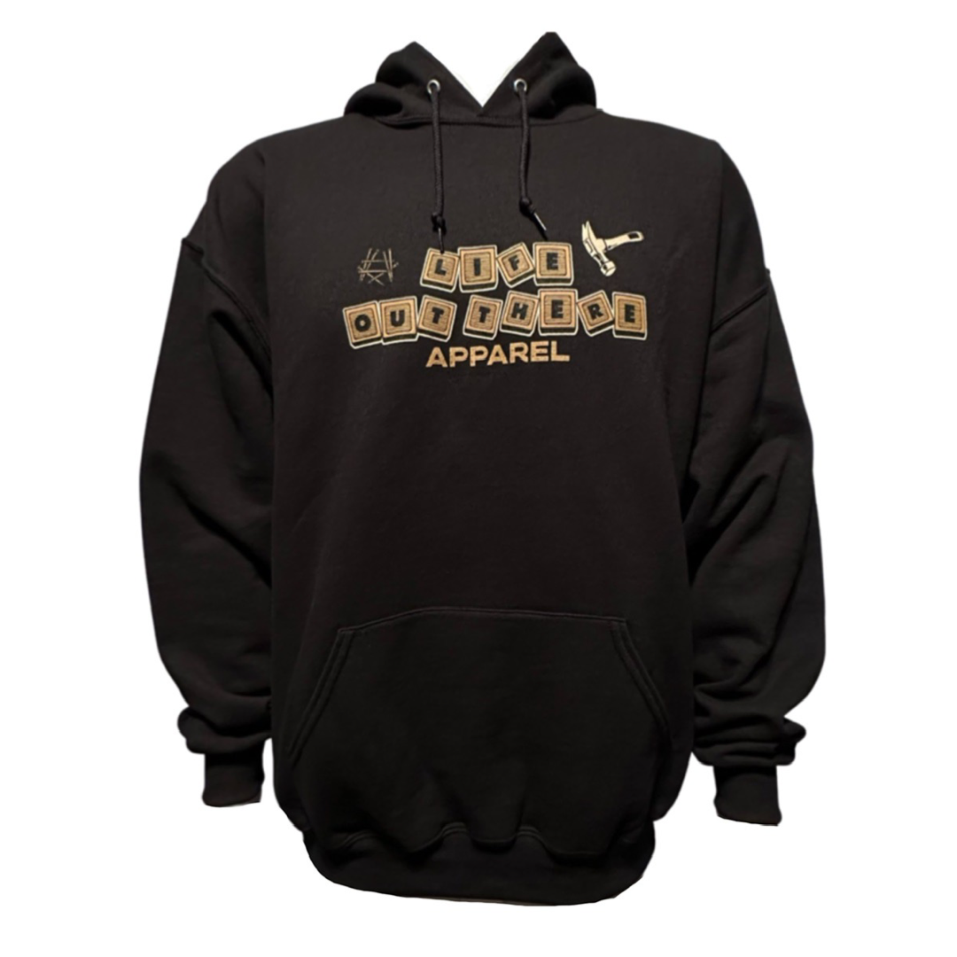 The Unisex Thanks Dad Hoodie in black, by Life Out There Apparel, is made from a comfortable cotton polyester blend. It showcases the phrase "Life Out There Apparel" in a gold, block-style font on the front, complemented by a small hammer graphic above to honor dads. It also includes a front pocket and drawstrings for added comfort and style.