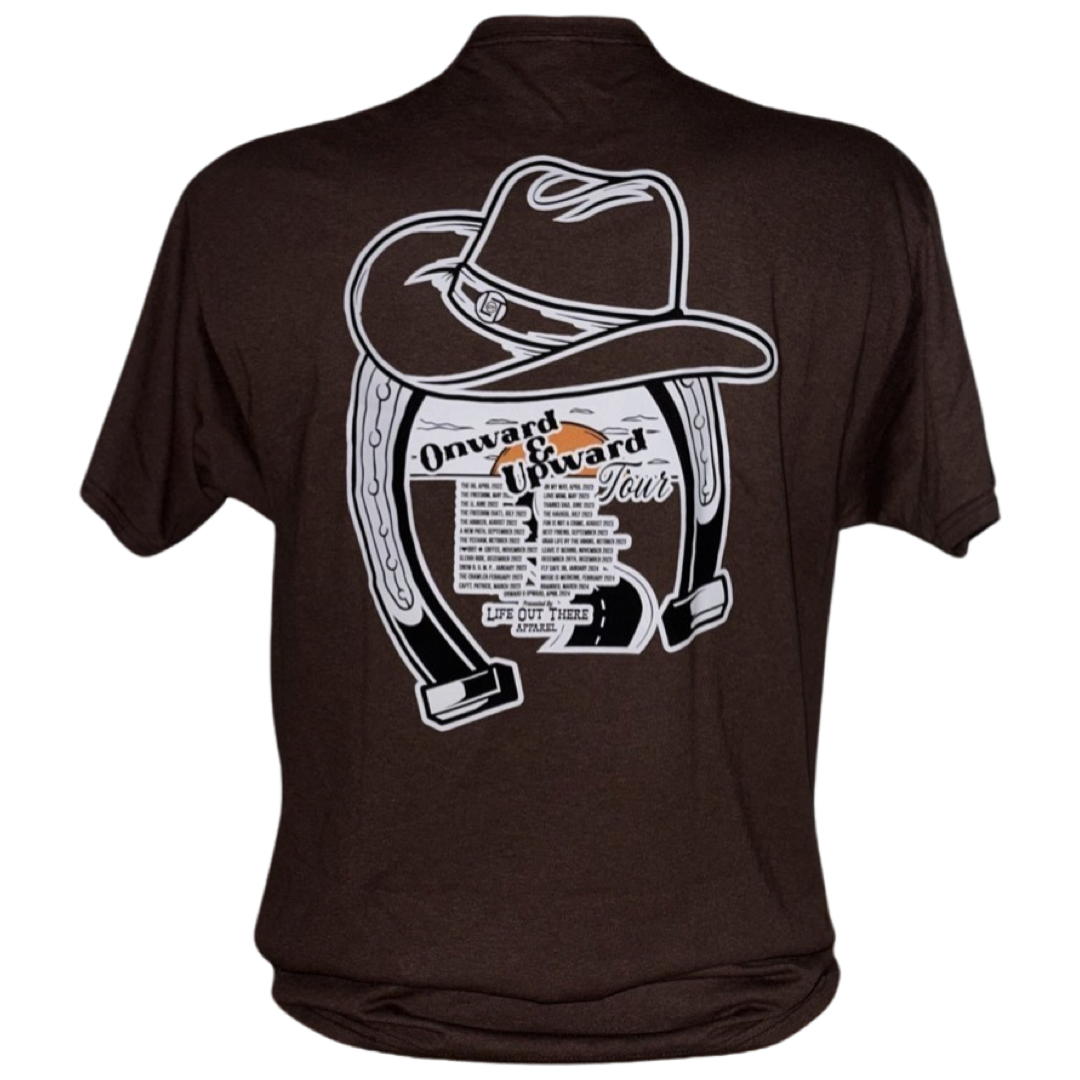 “ONWARD & UPWARD” Tour :
The Chocolate Brown Life Out There Apparel “ONWARD & UPWARD” Tour Unisex tee in is a country concert design with a cowboy hat & horseshoe on the front and back, with all the design names from the past 2 years (instead of city & tours dates) This photo is of the back of the chocolate brown tee with a transparent background.