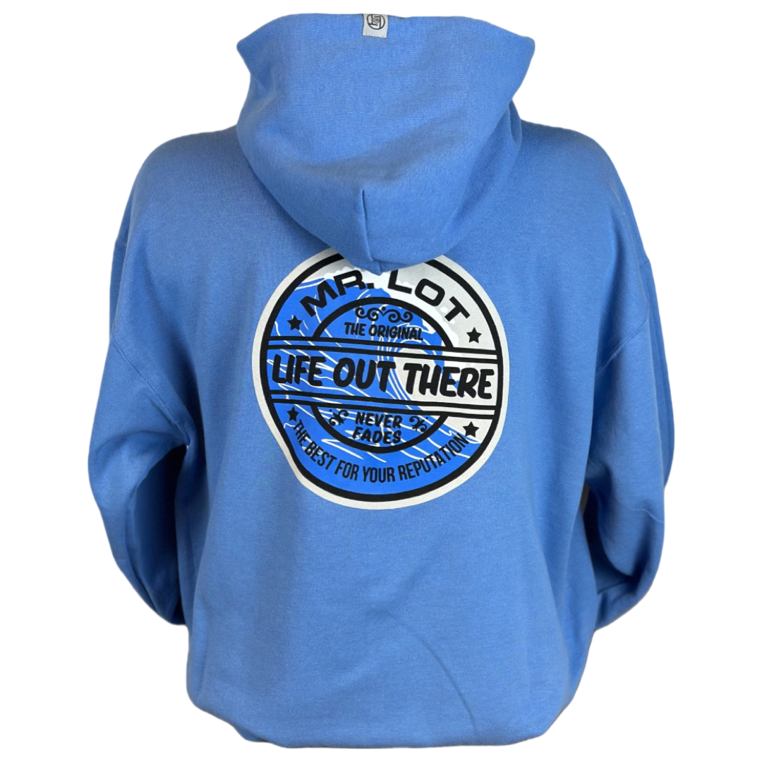 A person is seen from behind wearing the Unisex Summer Vibes Hoodie in Columbia Blue by Life Out There Apparel. The hoodie features a circular logo that radiates SUMMER VIBES and includes phrases like "Mr. Lot, The Original," "Life Out There," "Never Fades," and "The Best for Your Reputation" in diverse fonts. Designed with a relaxed fit, it perfectly captures the spirit of surfboard wax.