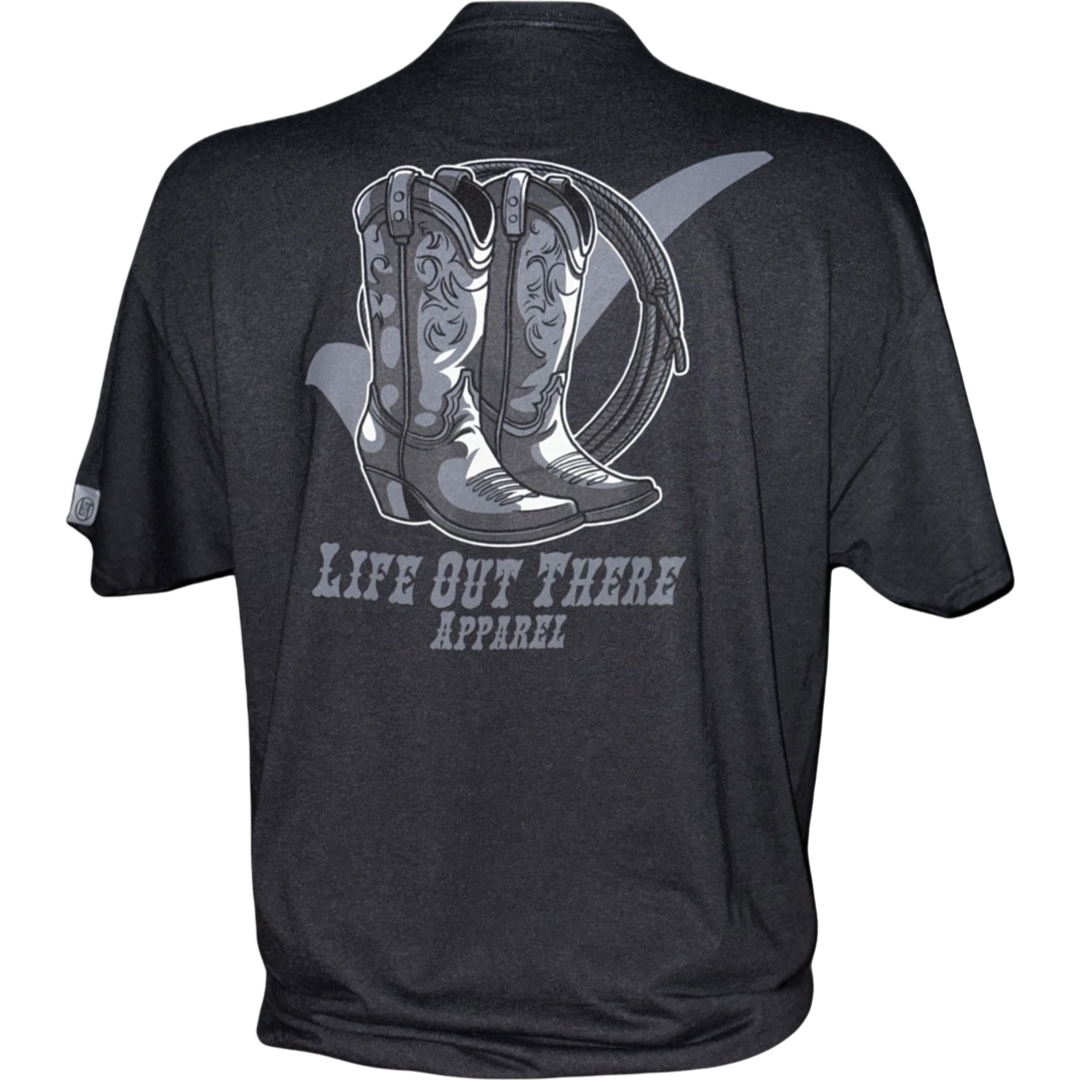 Introducing the "Unisex" Boot Check Tee in black from Life Out There Apparel—it features a design of cowboy boots and a lasso with the brand's name on the back. Wear it as a reminder to embrace your journey and support mental health and one another.