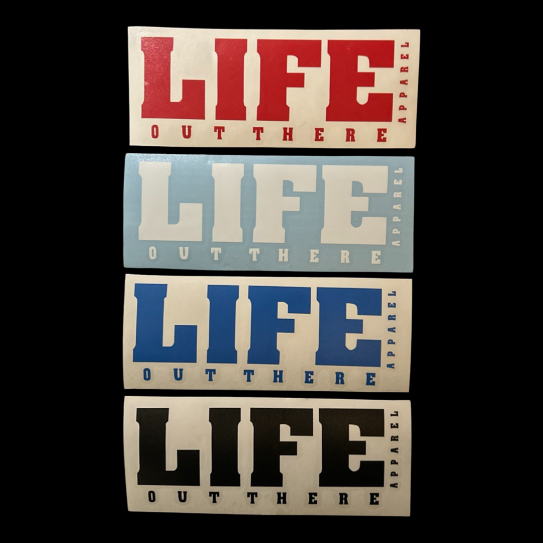 Product Description: The Life Out There - Die Cut Sticker, an 8-inch vinyl sticker collection by Life Out There Apparel, features four rectangular designs with bold text in vibrant colors: red, white, blue, and black. Each sticker prominently displays the word "LIFE" alongside a vertically aligned "OUT THERE APPAREL.
