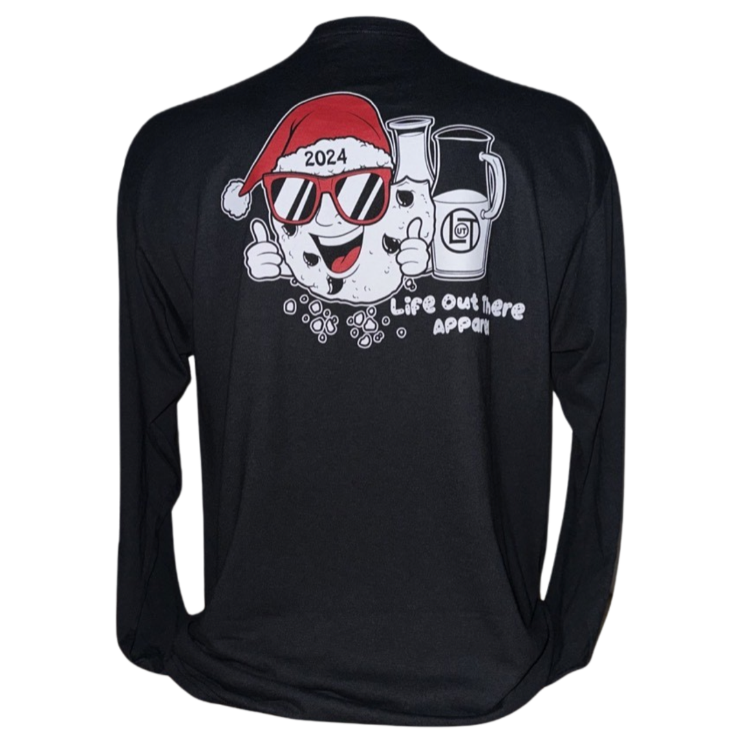 Black shirt with a cartoon cookie wearing a Santa hat and sunglasses labeled "2024," alongside glass milk cartons. Text reads, "Life Out The Apparel.