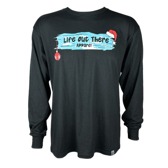 Life Out There Apparel “December 26th” black Unisex long sleeve tee shows Santa Clause camping in the desert, in a travel trailer, while relaxing after the big day and burning his Christmas tree, all inside a Christmas ornament - front of the shirt.