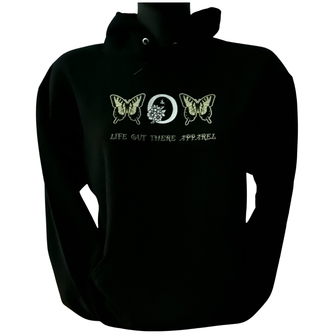Black "Love Mom Hoodie" by Life Out There Apparel, showcasing a central circular design on the chest with two monarch butterflies. An ideal Mother's Day gift, it subtly conveys its nature-inspired elegance with "LOVE MOM.