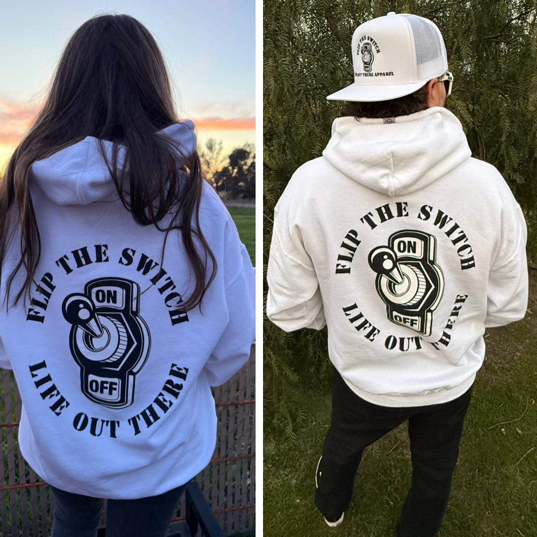 Two images feature people in Life Out There Apparels Unisex Flip The Switch Hoodie in white, adorned with a striking on/off switch graphic. Left: an individual with long hair. Right: a person in a hat enjoying nature. Celebrate our anniversary with this bold style!.