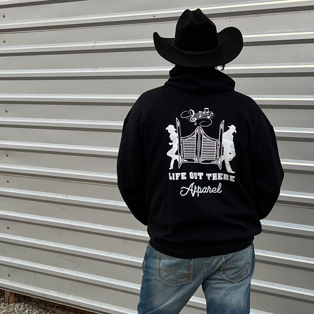 Backside of black zip-up hoodie from Life Out there, featuring designs inspired by country music.