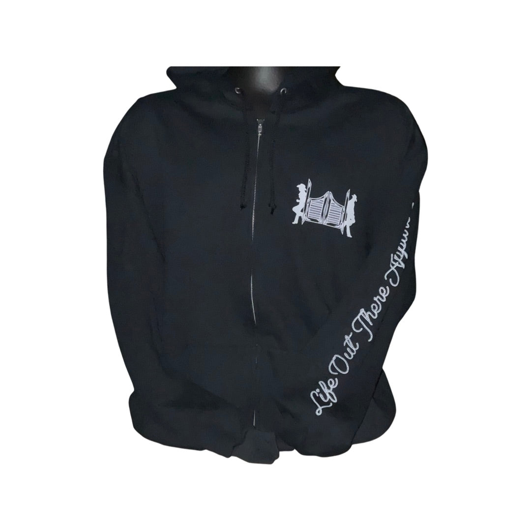 Unisex black zip-up hoodie from Life Out there, featuring designs inspired by country music. Front side.