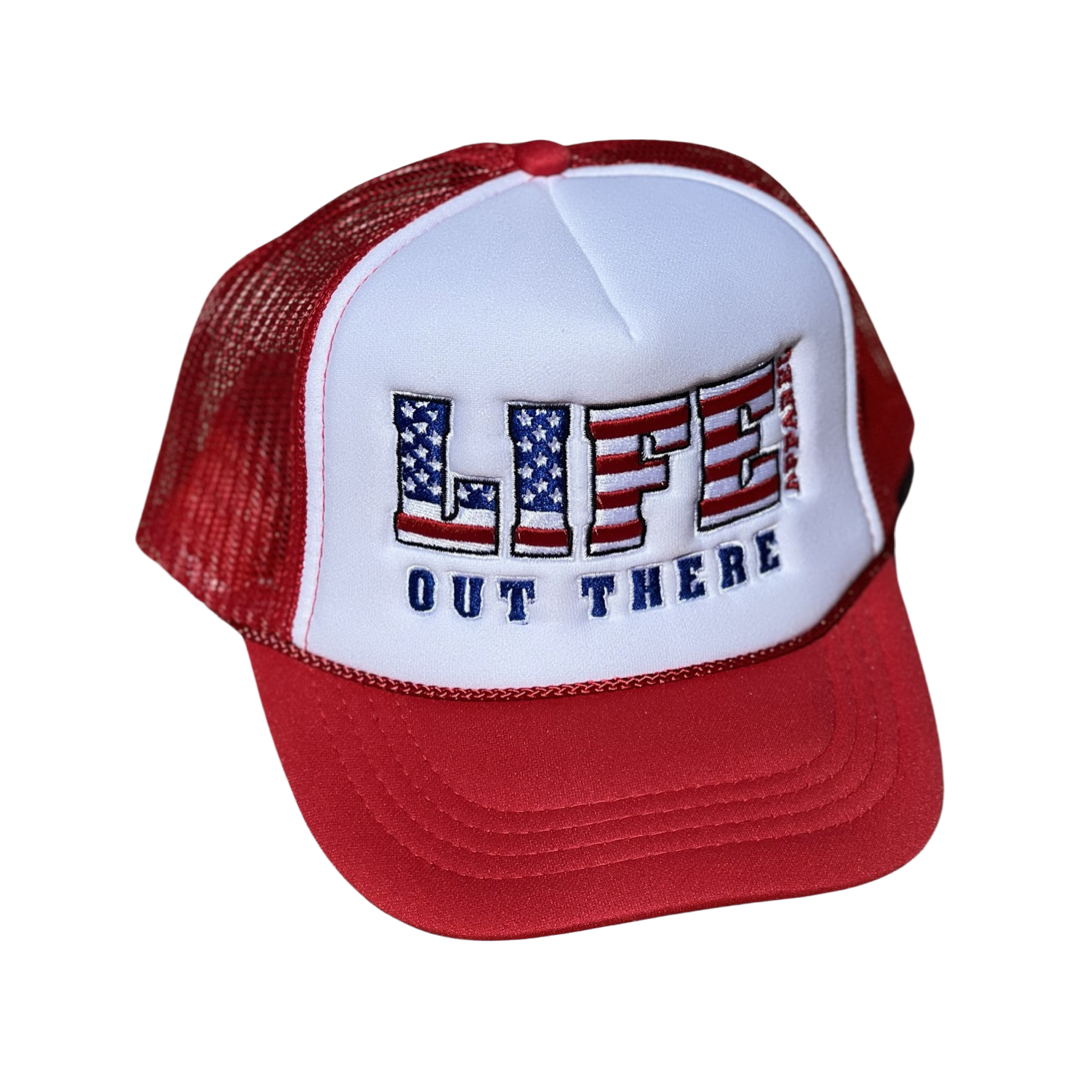 The Youth The Freedom Embroidered Snapback Trucker Hat in red and white by Life Out There Apparel features a design reminiscent of the American flag, celebrating the 4th of July with "LIFE OUT THERE" embroidered on the front. This American apparel includes a mesh back for enhanced comfort.