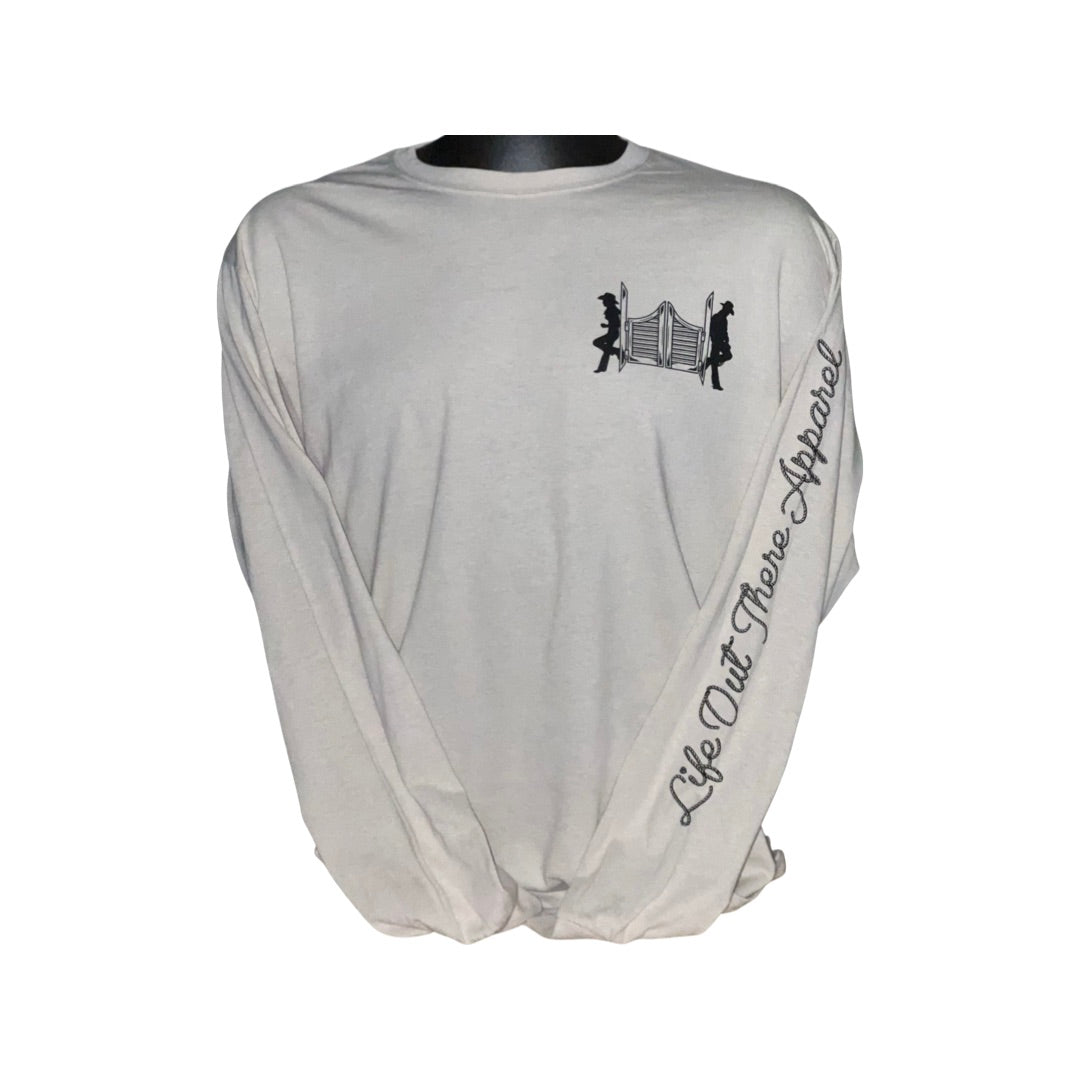 Unisex THE YEEHAW Long Sleeve T Shirt in Sandstone/Black by Life Out There Apparel showcases a serene ranch life vibe with its small chest logo depicting two silhouetted figures opening a gate. The sleeve features the brand's name, adding a "Yeehaw" spirit to your wardrobe.