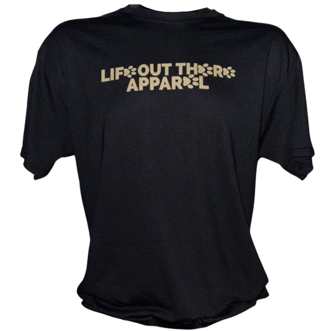 Life Out There Apparel “Best Friend” Unisex tee shirt in black. This is the front of the shirt with life out there written with some paw prints on it. This is a tribute to our best friend who is a Labrador retriever dog on a hike with his humans. 