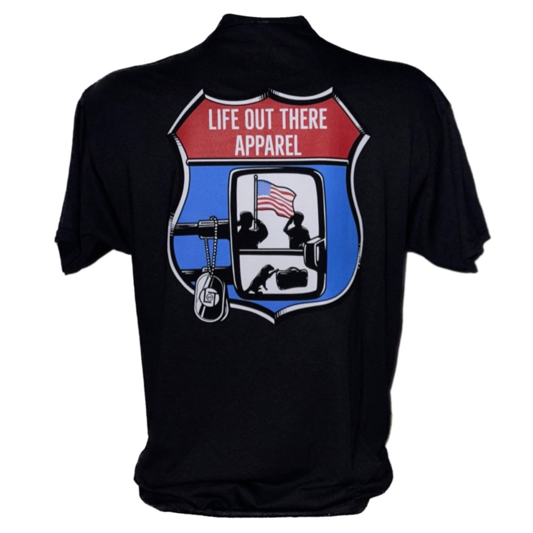 Life Out There Apparel “Leave It Behind” Black Unisex tee shirt has a truck side mirror with the reflection of a male, female & K9 soldiers saluting the American flag - bringing awareness to P. T. S. D. (post traumatic stress disorder). This is a photo of the back of the tee shirt with a white background. 