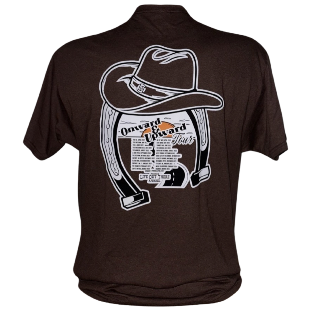 “ONWARD & UPWARD” Tour :
The Chocolate Brown Life Out There Apparel “ONWARD & UPWARD” Tour Unisex tee in is a country concert design with a cowboy hat & horseshoe on the front and back, with all the design names from the past 2 years (instead of city & tours dates) This photo is of the back of the chocolate brown tee with a transparent background. 