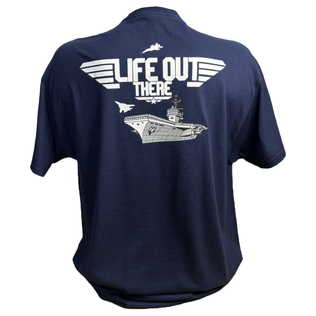 The Unisex - The Hard Deck Tee by Life Out There Apparel is a navy blue T-shirt featuring a graphic on the back with a stylized aircraft carrier and jets, reminiscent of TOPGUN MAVERICK, and bold white LIFE OUT THERE text.