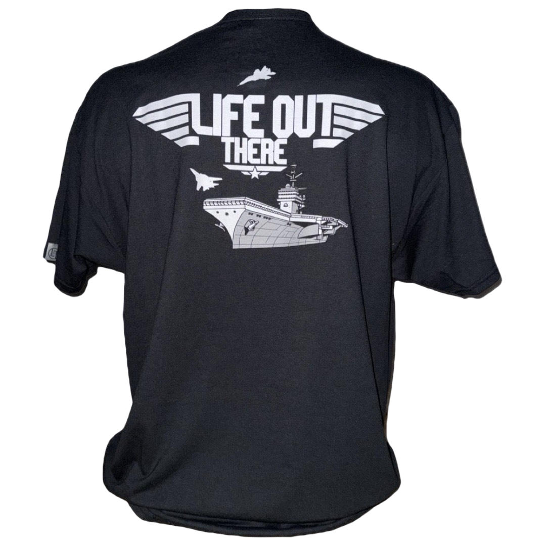 The Unisex Black Hard Deck Tee by Life Out There Apparel features a graphic with an aircraft carrier and fighter jets, plus LIFE OUT THERE printed on the back. Ideal for US Military or TOPGUN enthusiasts.